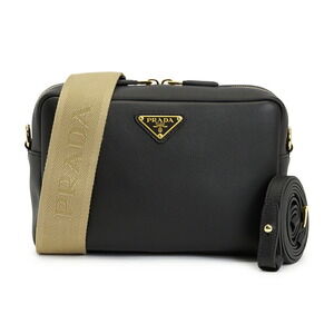 Prada black leather shoulder bag logo print woven strap